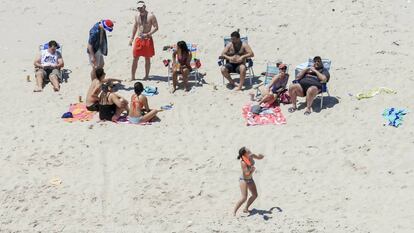 Christie e a família tomam sol