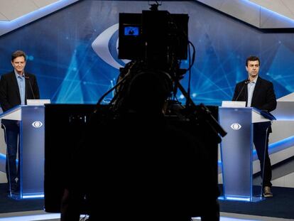 Marcelo Crivella e Marcelo Freixo (R) no debate da TV Bandeirantes