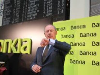 El ex presidente de Bankia, Rodrigo Rato, durante el acto de estreno burs&aacute;til de la entidad.