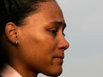 The three-time Olympic gold medalist Marion Jones cries as she address the media during conference outside the federal courthouse Friday, Oct. 5, 2007  in White Plains, NY. Jones guilty to lying to federal investigators when she denied using performance-enhancing drugs,. She also pleaded guilty to a second count of lying to investigators about her association with a check-fraud scheme. (AP Photo/Frank Franklin II)