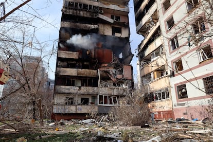 A residential multi-story building is seen damaged after a Russian missile hit it in southeastern city of Zaporizhzhia, Ukraine