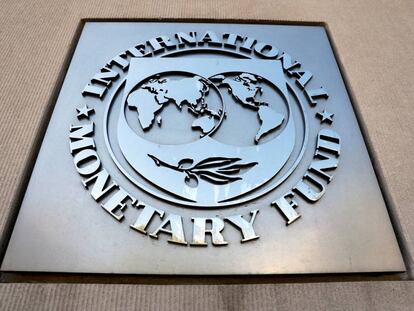 FILE PHOTO: International Monetary Fund logo is seen outside the headquarters building during the IMF/World Bank spring meeting in Washington, U.S., April 20, 2018. REUTERS/Yuri Gripas/File Photo