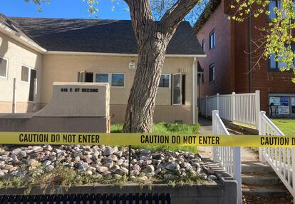 The fire-damaged Wellspring Health Access clinic is cordoned by tape, May 25, 2022, in Casper, Wyo.