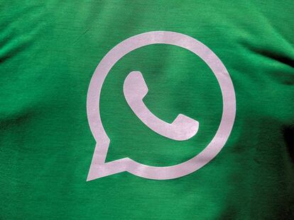 FILE PHOTO: A logo of WhatsApp is pictured on a T-shirt worn by a WhatsApp-Reliance Jio representative during a drive by the two companies to educate users, on the outskirts of Kolkata