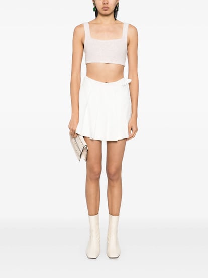 La minifalda plisada se convierte en la prenda más cómoda de llevar gracias a Ermanno Scervino que la transforma en la falda-pantalón que todas las seguidoras del tenniscore querrán tener.  (Comprar 1.643 euros) 
