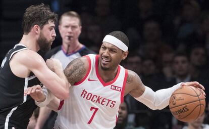 Carmelo Anthony y Joe Harris en un Houston-Brooklyn.