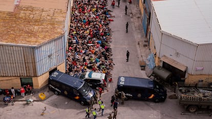 Unaccompanied minors who crossed into Spain outside a warehouse used as temporary shelter in Ceuta on Wednesday. 