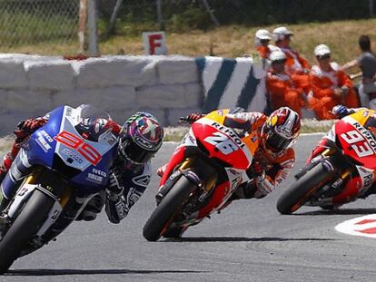 Lorenzo, Pedrosa y Marc Marquez durante la carrera.