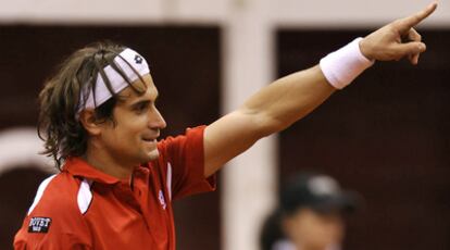 David Ferrer celebra su victoria ante Chiudinelli.