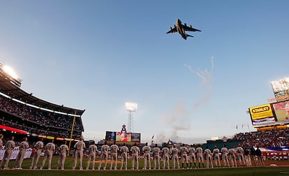 A C-17 Globemaster military aircraft flies over Angels Stadium in Anaheim during Opening Day celebrations in 2010.