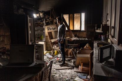 Ali Salman inspects damages to his family house that was hit by Israeli shelling in the Kfar Kila border village with Israel in south Lebanon, Saturday, Nov. 25, 2023