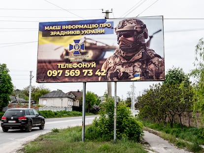 A sign inviting to join the Ukrainian army, on the entrance road to Kupiansk, on May 10.
