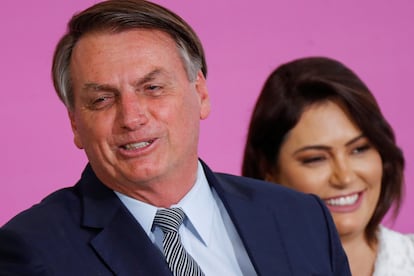 O presidente Jair Bolsonaro e sua esposa Michelle em cerimônia pelo Dia Internacional da Mulher, em março deste ano.