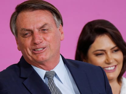 O presidente Jair Bolsonaro e sua esposa Michelle em cerimônia pelo Dia Internacional da Mulher, em março deste ano.