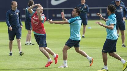 Xavi e Iniesta en el entrenamiento de hoy.