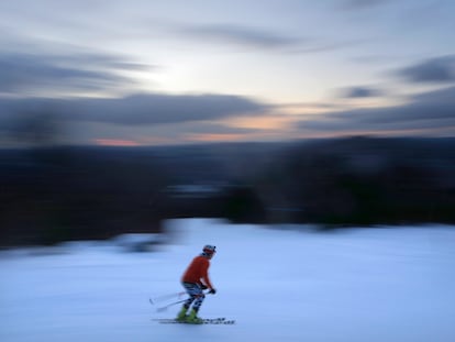 A skier descends Black Mountain of Maine, Feb. 11, 2023, in Rumford, Maine.