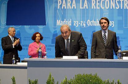 Colin Powell, Ana Palacio, Ayad Alauí y José María Aznar, ayer durante la segunda jornada de la Conferencia de Donantes.