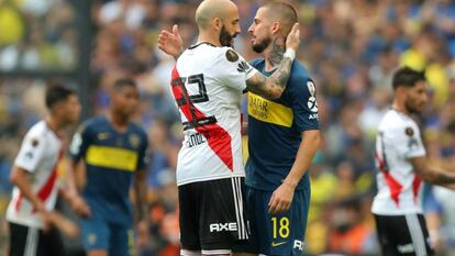  Piniola (i) y Benedetto, tras el partido. 