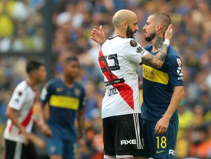  Piniola (i) y Benedetto, tras el partido. 