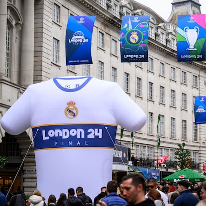 31 May 2024, Great Britain, London: A large jersey with the Real Madrid logo stands at the Champions Festival in Regent Street. The Champions League final between Dortmund and Real Madrid will take place at Wembley Stadium on Saturday, June 1. Photo: Tom Weller/dpa (Photo by Tom Weller/picture alliance via Getty Images)