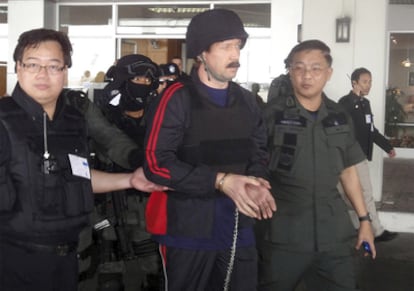 Viktor Bout, pictured during his extradition from Thailand to the United States one year ago.