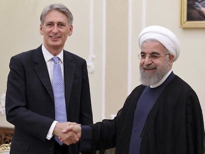 Rohani, con el ministro de Exteriores brit&aacute;nico el 24 de agosto.