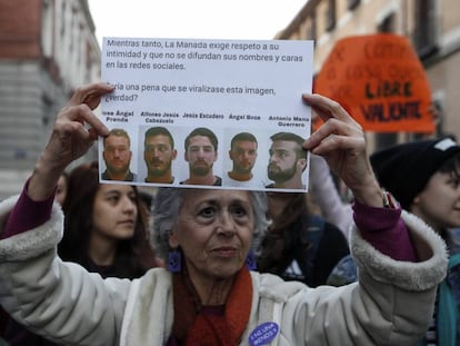 A woman protests outside the Pamplona court where the La Manada trial is taking place.