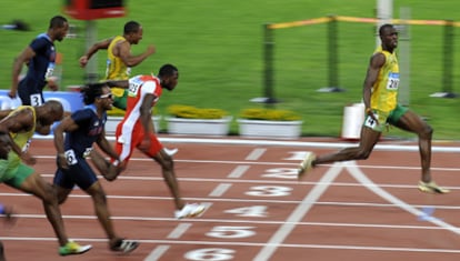 Usain Bolt, derecha, se impone con facilidad en la final de los 100 metros sobre Thompson ( segundo) y Dix ( tercero) y el resto de los rivales, durante los Juegos Olímpicos de Pekín 2008.