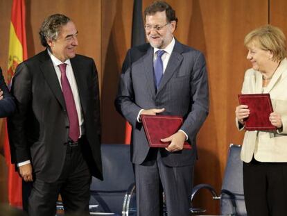 Rosell amb Rajoy i Merkel a Berlín el passat dia 1 de setembre.
