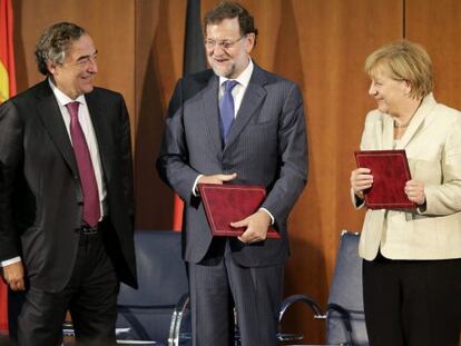 Rosell junto a Rajoy y Merkel en Berlín el pasado día 1 de septiembre.