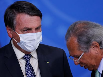 O presidente Jair Bolsonaro e o ministro da Economia, Paulo Guedes, em um evento em 9 de agosto em Brasília.