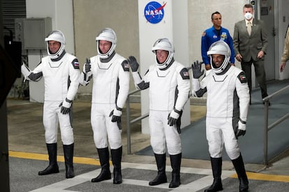 From left, Russian cosmonaut Andrei Fedyaev, NASA astronauts Warren Hoburg and Stephen Bowen, and United Arab Emirates astronaut Sultan al-Neyadi wave as they leave the Operations and Checkout building for a trip to Launch Pad 39-A Wednesday, March 1, 2023, at the Kennedy Space Center in Cape Canaveral, Fla.