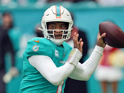 Miami Dolphins quarterback Tua Tagovailoa looks to pass during the first half of an NFL football game against the Green Bay Packers, December 25, 2022, in Miami Gardens, Florida.