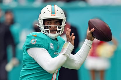 Miami Dolphins quarterback Tua Tagovailoa looks to pass during the first half of an NFL football game against the Green Bay Packers, December 25, 2022, in Miami Gardens, Florida.