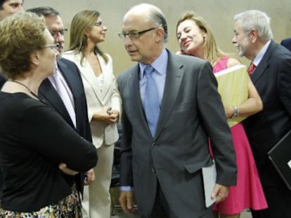 Carmen Martínez Aguayo y Cristóbal Montoro, en una reunión celebrada en julio pasado.