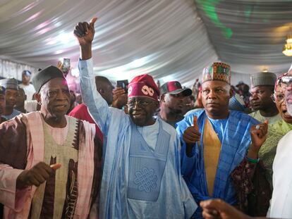 Bola Tinubu of the All Progressives Congress, center, celebrates with supporters at the party's campaign headquarters after winning the presidential elections in Abuja, Nigeria, Wednesday, March 1, 2023.