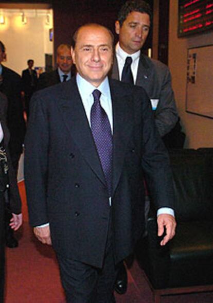 Berlusconi llega a la reunión del Ecofin en Bruselas.