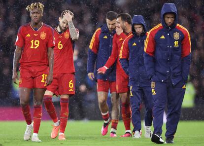 Spain players walk off dejected following a Euro 2024 group A qualifying soccer match between Scotland and Spain at the Hampden Park stadium in Glasgow, Scotland, Tuesday, March 28, 2023.