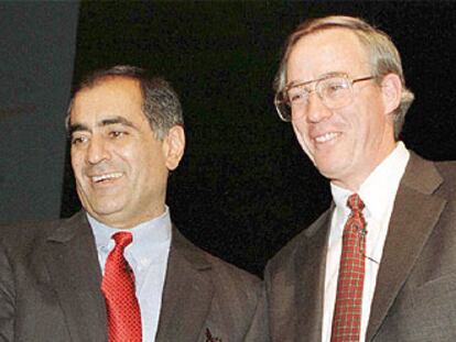 Los presidentes de Morgan y Dean Witter, J. J. Mack y P.J. Purcell.