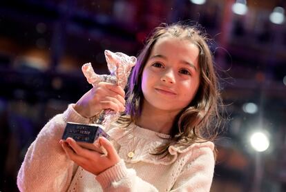 Sofia Otero, actress, displays the Silver Bear for Best Acting Performance in a Leading Role in the film "20.000 especies de abejas" after the award ceremony of the International Film Festival, Berlinale, in Berlin, Germany, Saturday, Feb. 25, 2023.