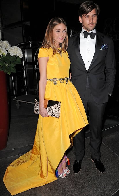 Olivia Palermo in a stunning yellow dress with Johannes Huebl