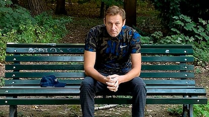 Russian opposition leader Alexei Navalny sitting on a bench in Berlin on September 23.