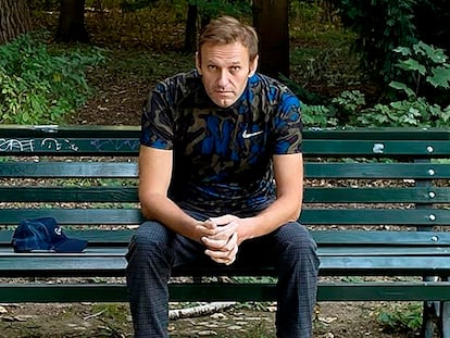 Russian opposition leader Alexei Navalny sitting on a bench in Berlin on September 23.