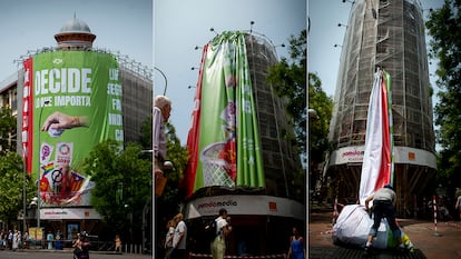 Retirada del cartel de Vox del edificio en la esquina de las calles de  Goya y de Alcalá, en Madrid, el martes 27 de junio.