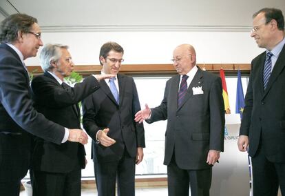 Feij&oacute;o, cuando anunci&oacute; la fusi&oacute;n junto a los directivos de las cajas, dos de ellos ahora en prisi&oacute;n.