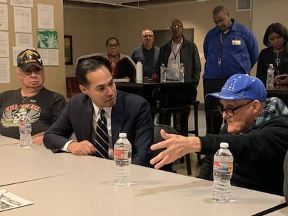 Castro (2nd l) at a panel discussion with homeless veterans in Los Angeles.