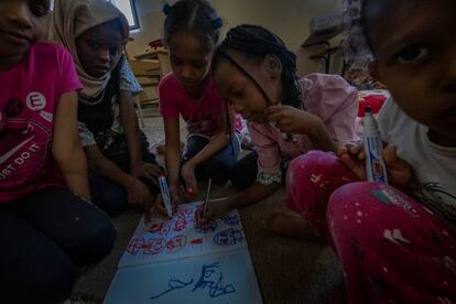 A group of girls who survived the floods at a shelter set up in a school in Derna, September 17.