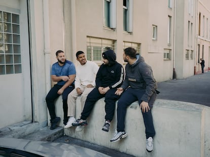 Business students rest during recess near the Félix Payet area in Marseille on Friday.