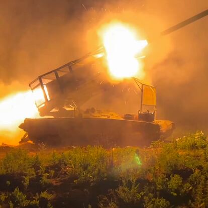 In this photo taken from a video released by Russian Defense Ministry press service on Wednesday, Nov. 13, 2024, the Russian army's multiple rocket launcher Solntsepyok fires towards Ukrainian positions in the border area of Kursk region, Russia. (Russian Defense Ministry Press Service via AP)