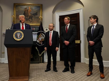 U.S. President Donald Trump delivers remarks on AI infrastructure, next to Oracle co-founder Larry Ellison, SoftBank CEO Masayoshi Son and OpenAI CEO Sam Altman at the Roosevelt room at White House in Washington, U.S., January 21, 2025